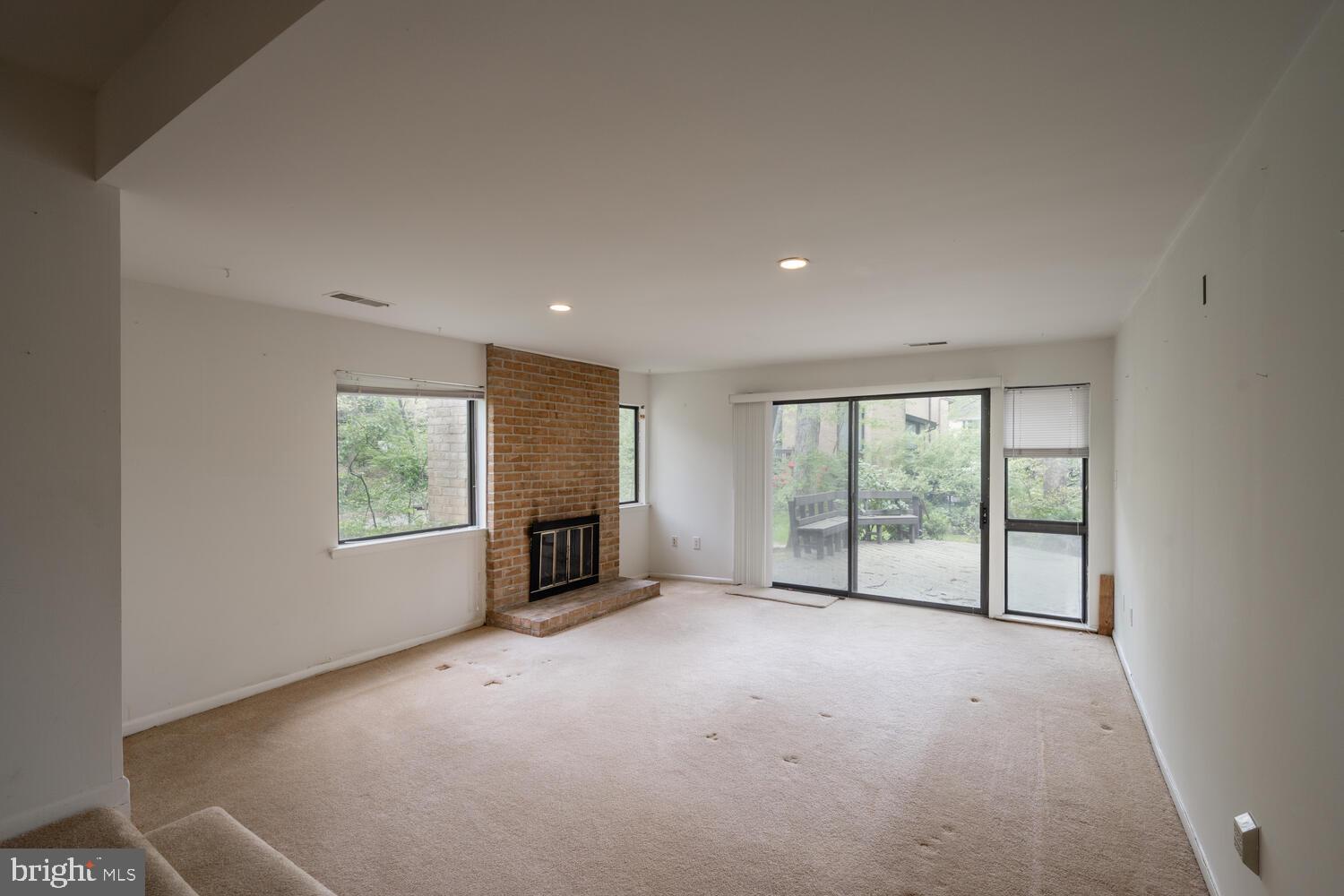 2029 Lakebreeze Way Reston, VA 20191 - Photo 19 of 32 Finished walk-out lower level leads to large deck