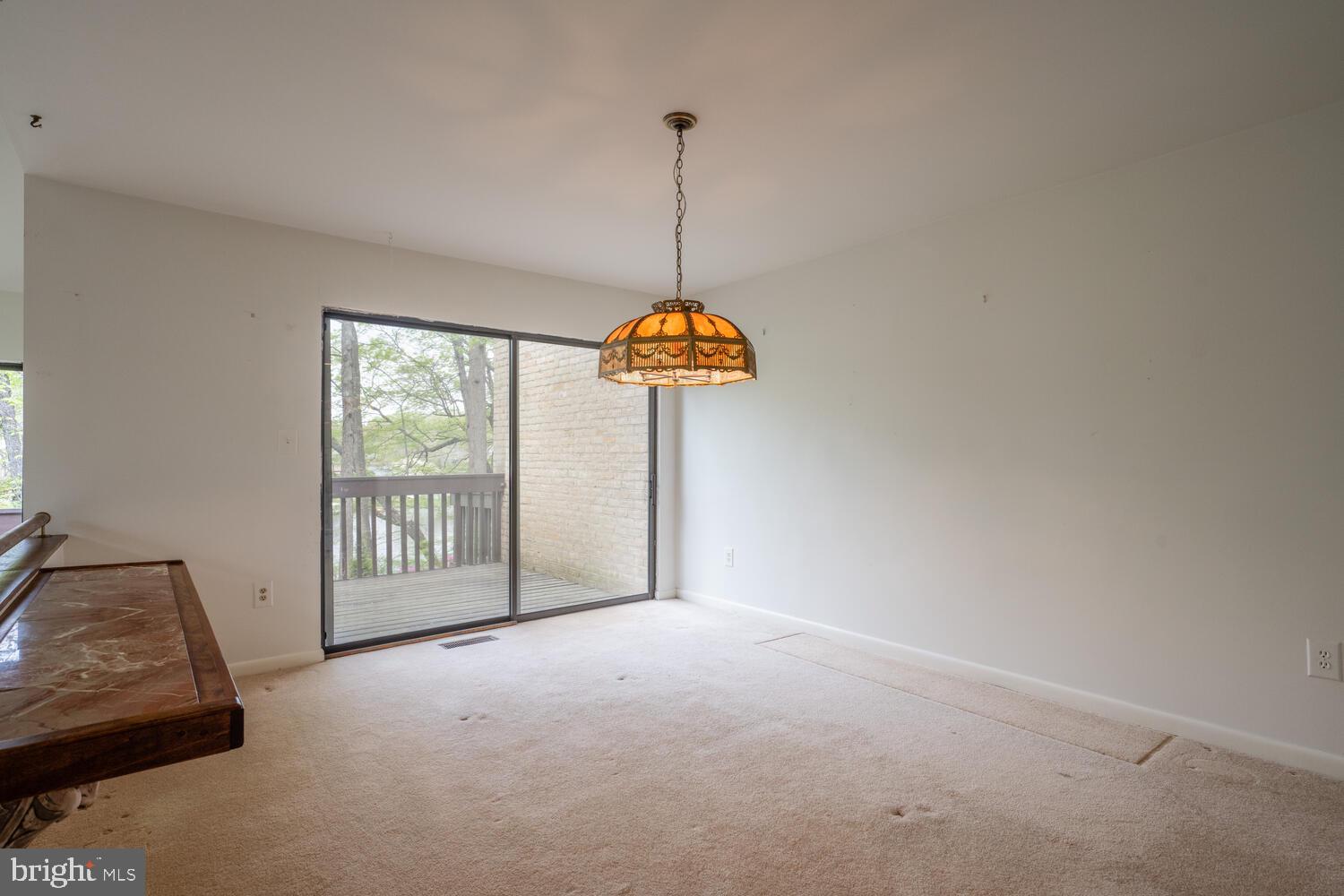 2029 Lakebreeze Way Reston, VA 20191 - Photo 7 of 32 Dining room leads to deck