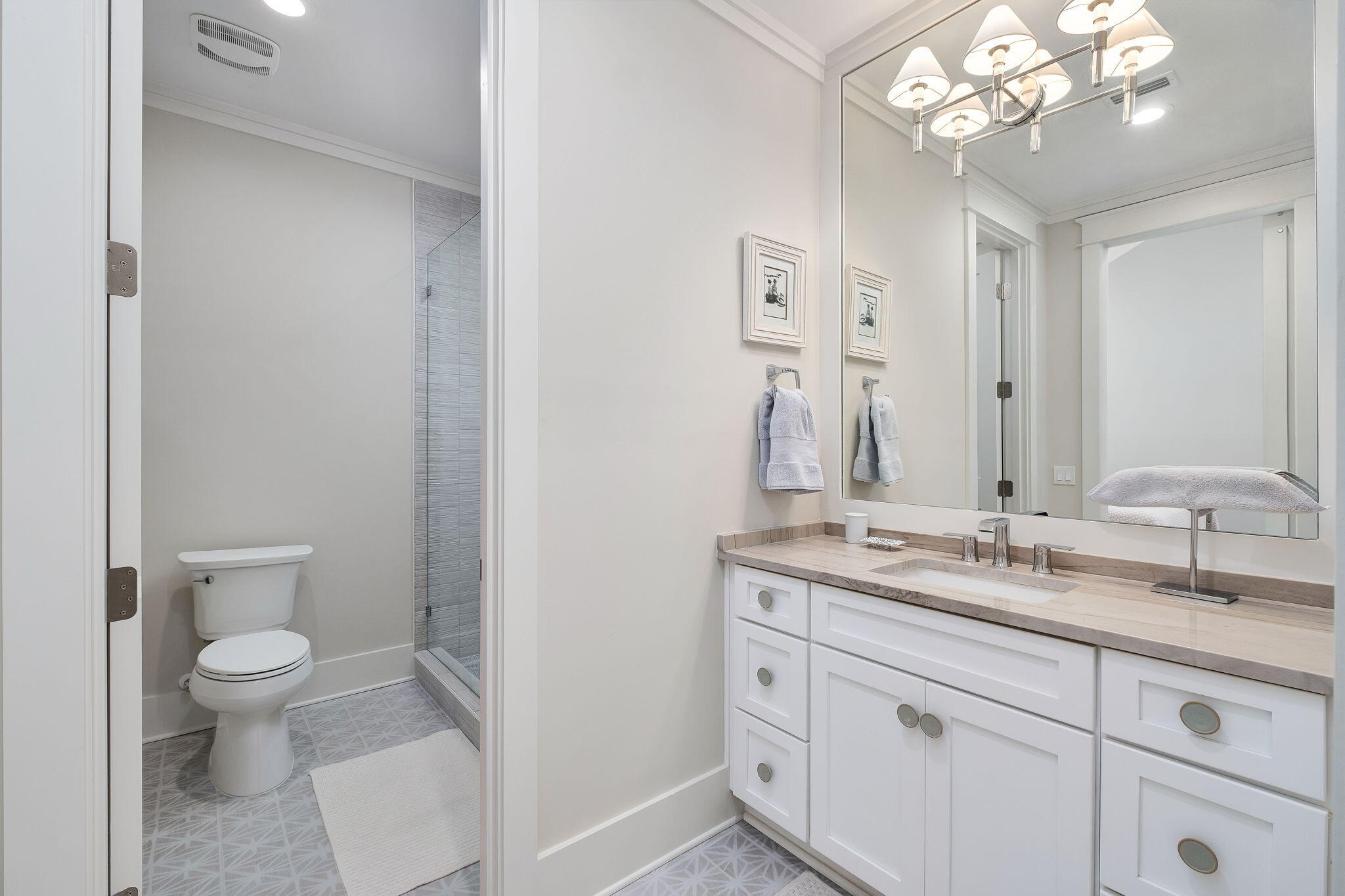 194 Sawbuck Dr Inlet Beach Inlet Beach, FL 32461 - Photo 20 of 38 a spacious bathroom with a granite countertop sink a toilet and a mirror