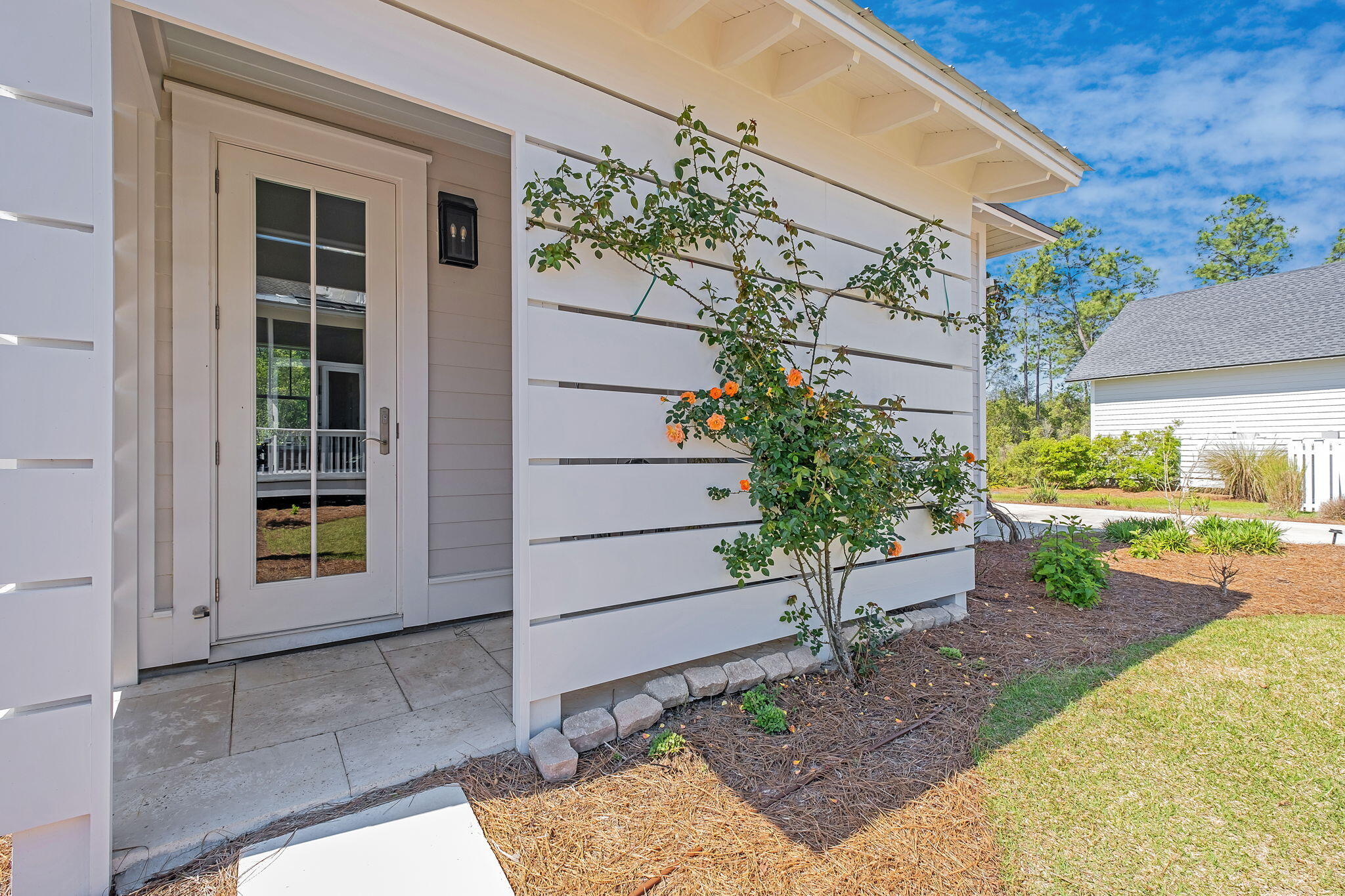194 Sawbuck Dr Inlet Beach Inlet Beach, FL 32461 - Photo 32 of 38 a view of a house with backyard and sitting area