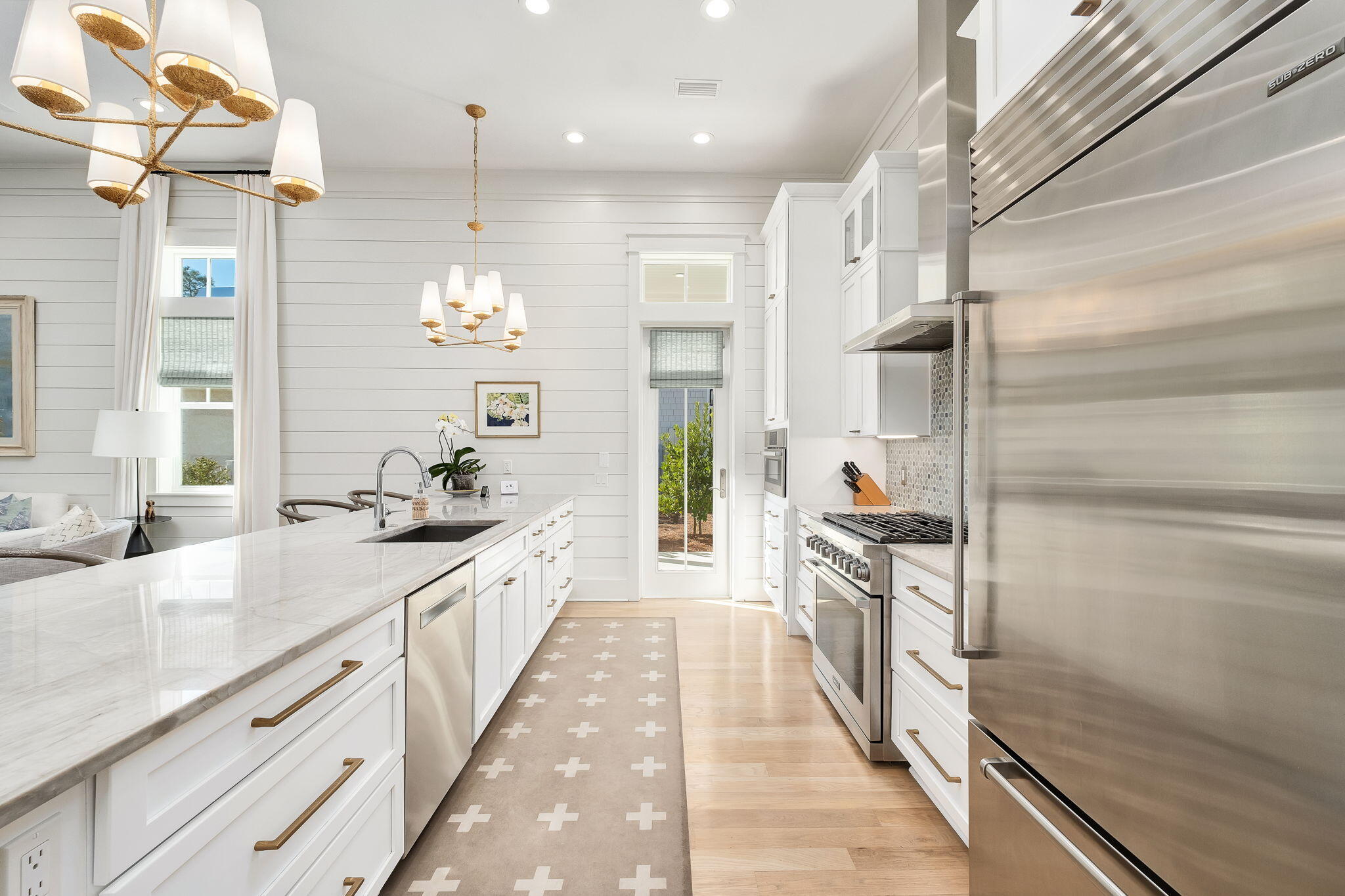 194 Sawbuck Dr Inlet Beach Inlet Beach, FL 32461 - Photo 4 of 38 a large kitchen with stainless steel appliances kitchen island granite countertop a sink and cabinets