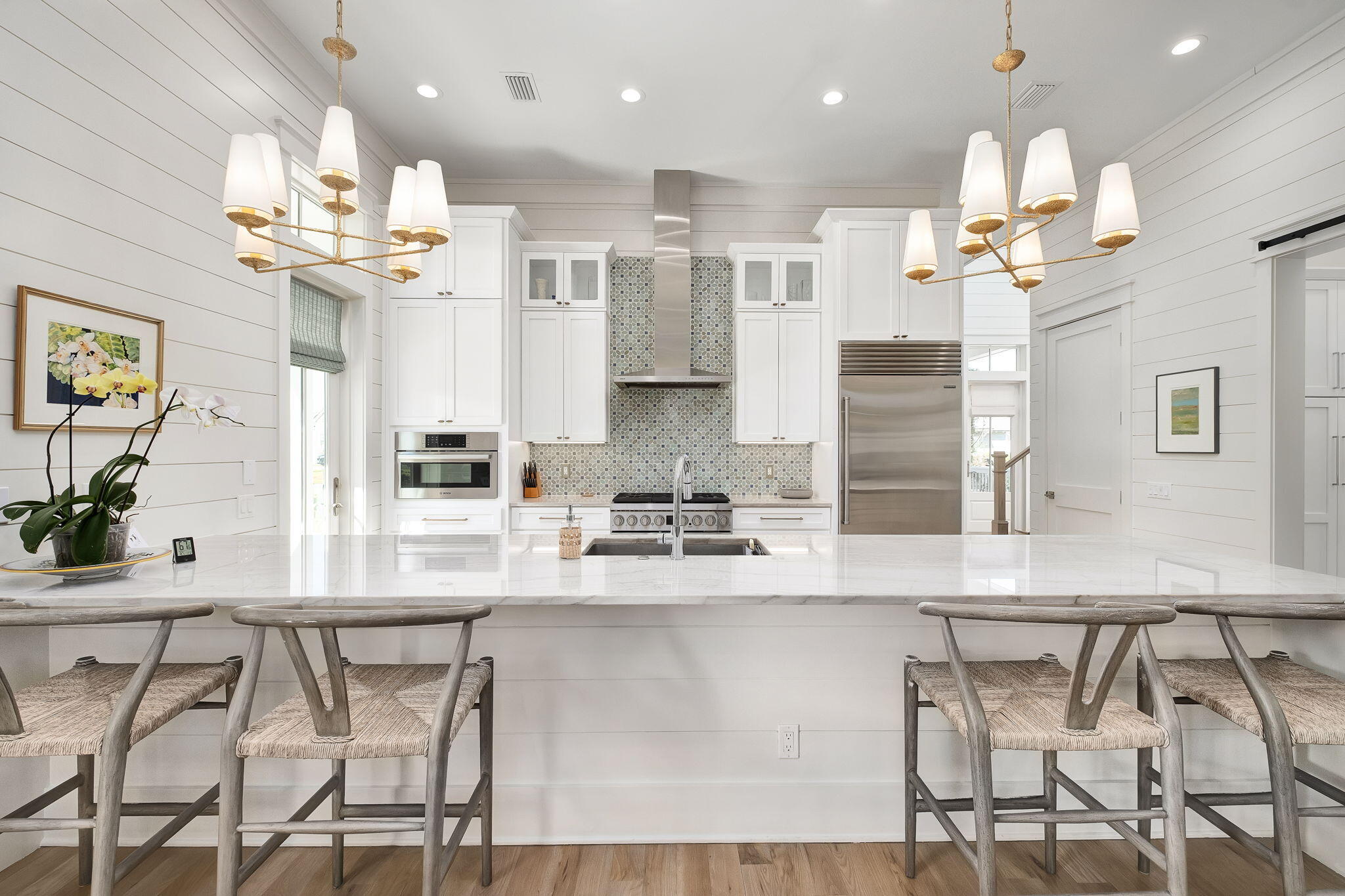 194 Sawbuck Dr Inlet Beach Inlet Beach, FL 32461 - Photo 5 of 38 a kitchen with kitchen island stainless steel appliances sink cabinets and wooden floor