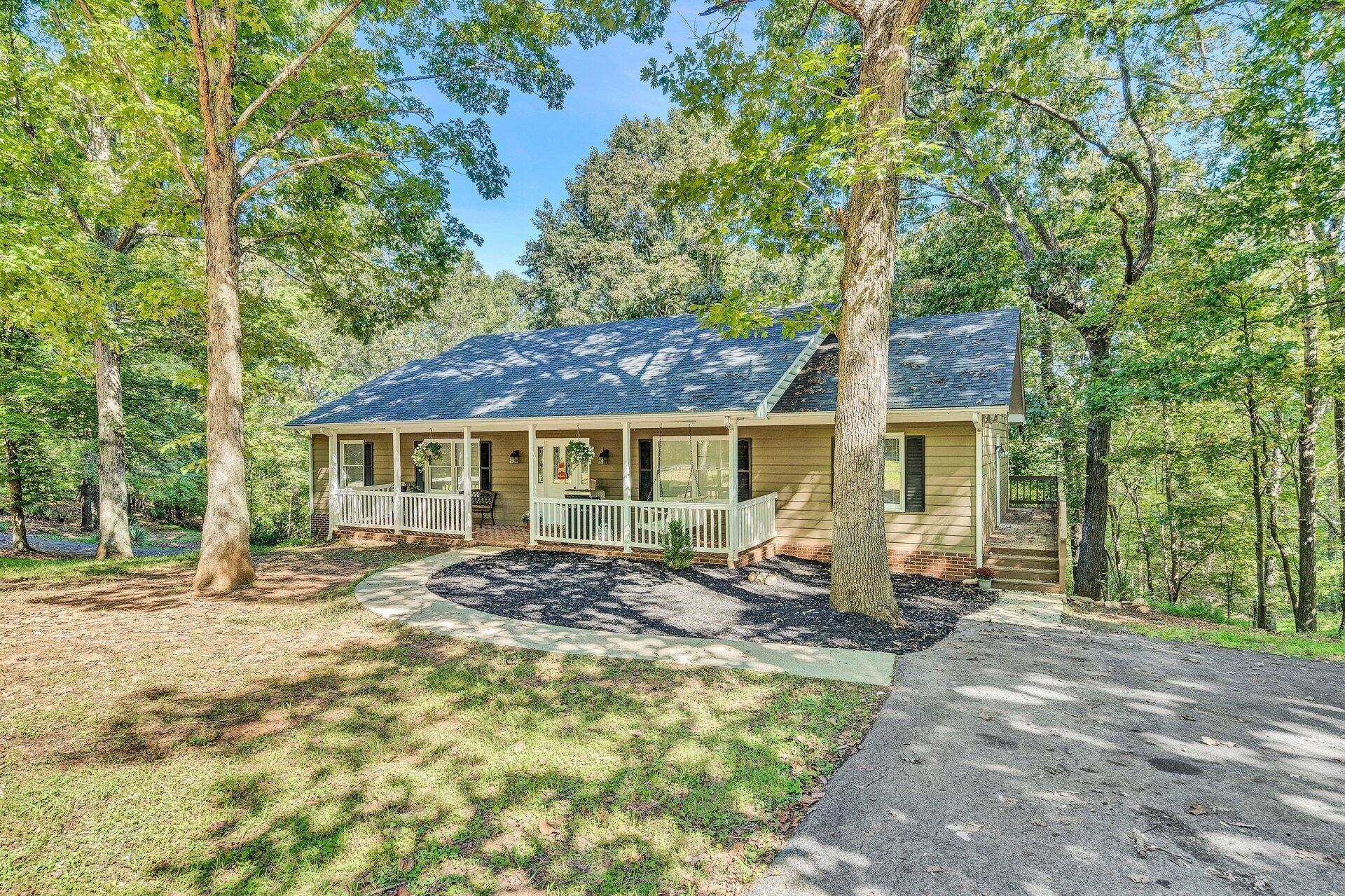 1842 Morris Road Goodview, VA 24095 - Photo 1 of 35 a front view of a house with yard