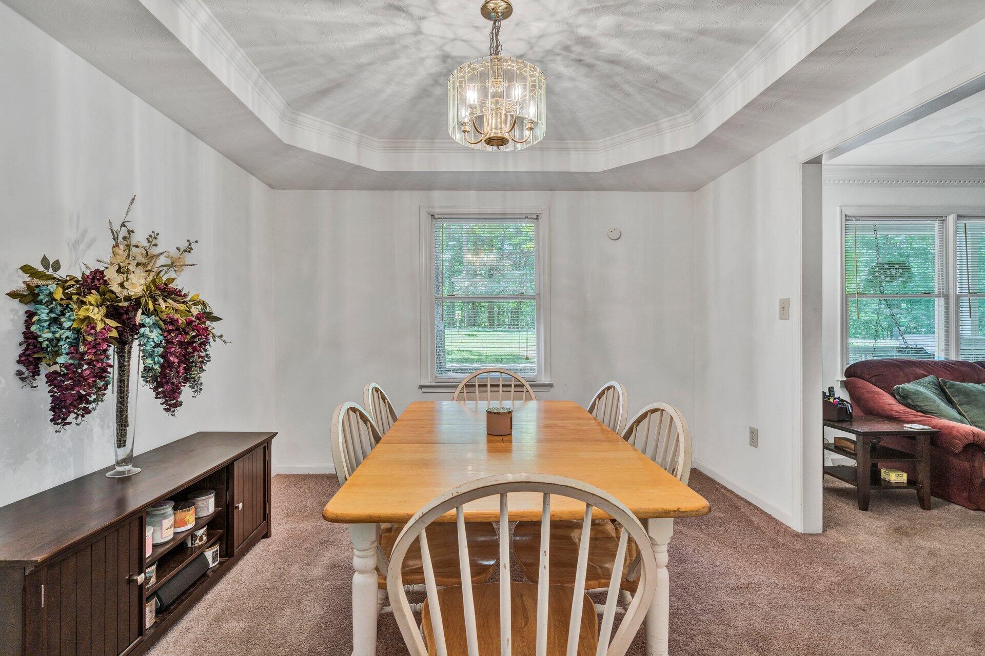 1842 Morris Road Goodview, VA 24095 - Photo 8 of 35 a view of a dining room with furniture window and outside view