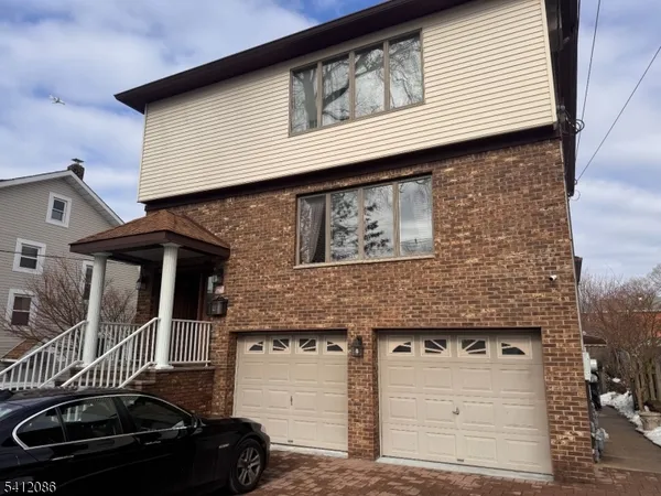 a front view of a house with a balcony