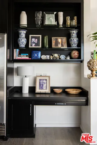 a kitchen with a stove and cabinets