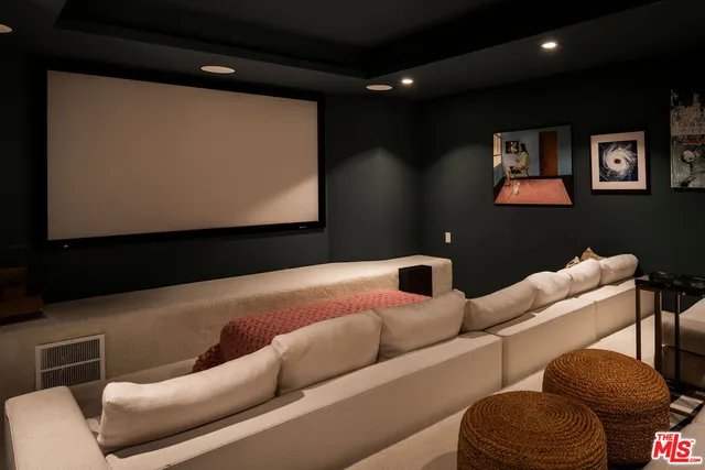 a projector room with a couch