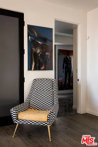 a bathroom with a mirror and a sink