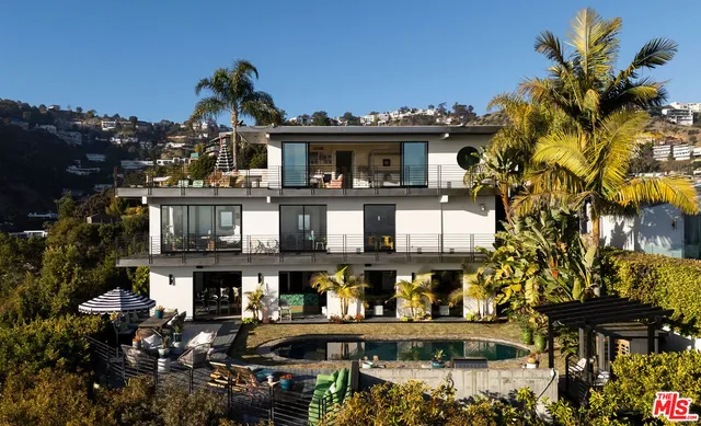 a view of a house with a swimming pool