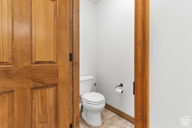 1340 Trapper Loop Garden City, UT 84028 - Photo 17 of 35 Bathroom featuring toilet and tile patterned flooring
