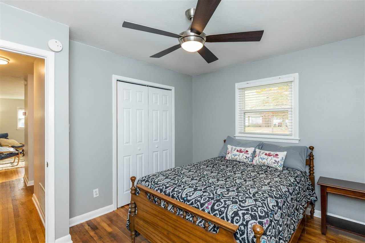 103 Crest Road Cary, NC 27513 - Photo 18 of 30 Ceiling fan, refurbished hardwoods, newish windows. Third bedroom