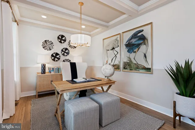 a workspace with furniture and window