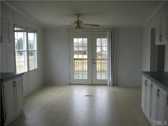 727 Wake County Line Road Zebulon, NC 27597 - Photo 5 of 12 eat in kitchen are.