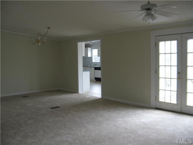 727 Wake County Line Road Zebulon, NC 27597 - Photo 7 of 12 dining room off kitchen and open to livingroom