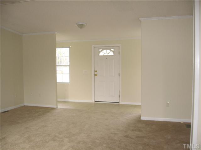 727 Wake County Line Road Zebulon, NC 27597 - Photo 8 of 12 Spacious entry area of living room