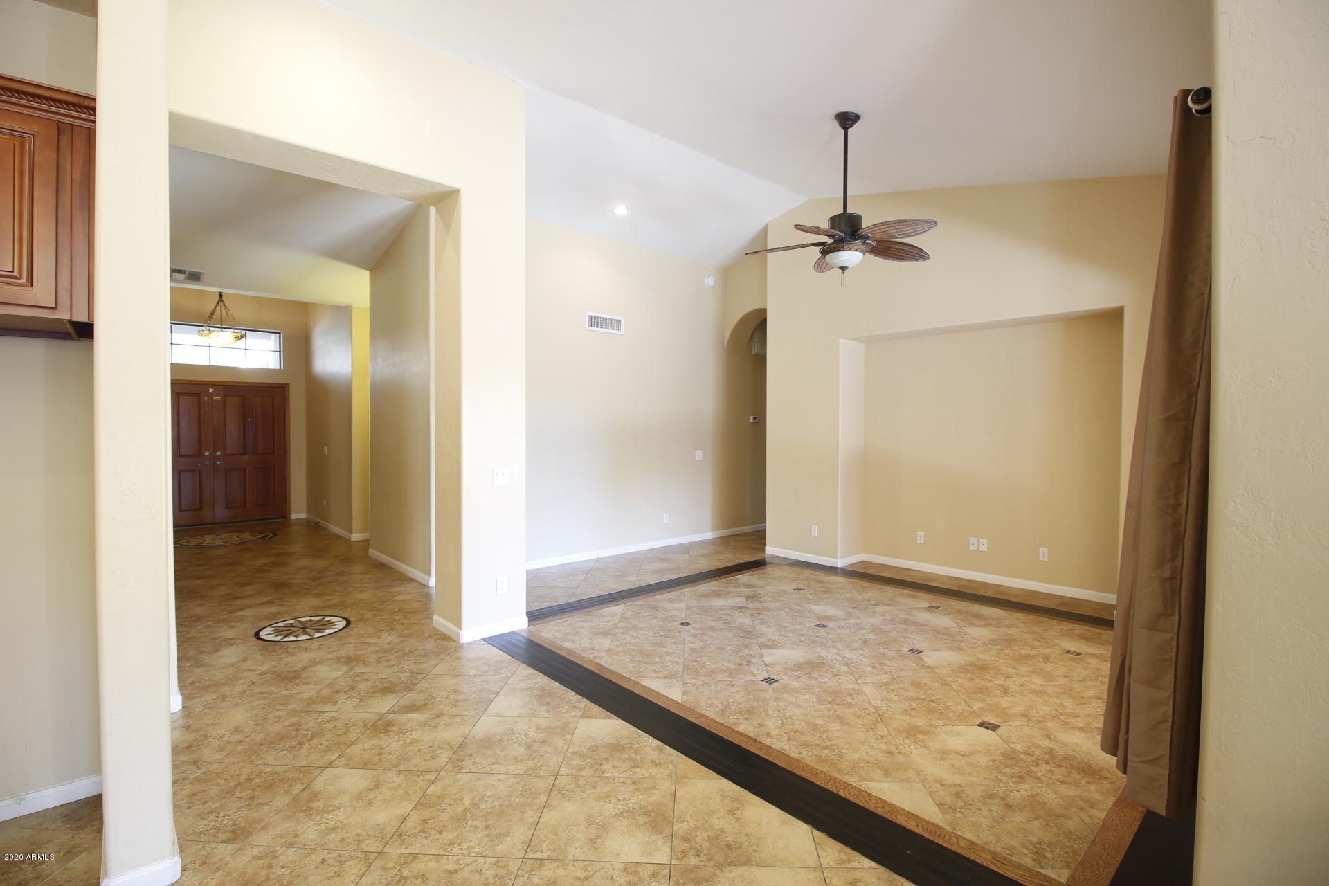 1611 West Del Rio Street Chandler, AZ 85224 - Photo 23 of 38 a view of a hallway with a chandelier