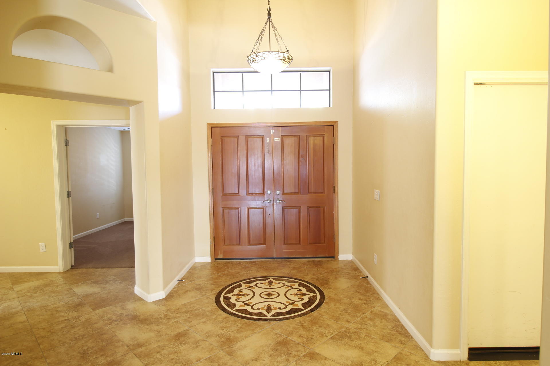 1611 West Del Rio Street Chandler, AZ 85224 - Photo 3 of 38 a view of a hallway with a door
