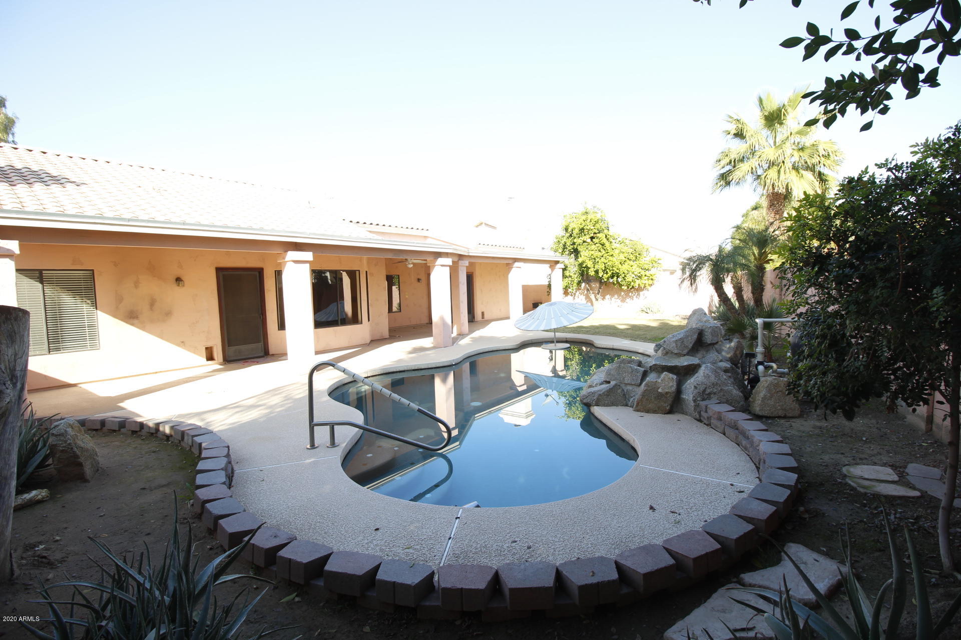 1611 West Del Rio Street Chandler, AZ 85224 - Photo 35 of 38 a view of a house with backyard porch and sitting area
