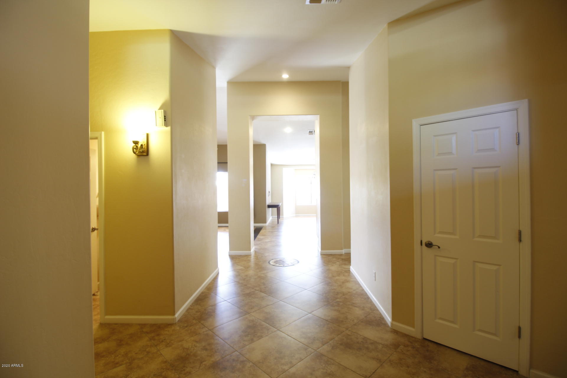 1611 West Del Rio Street Chandler, AZ 85224 - Photo 7 of 38 a view of a hallway with wooden floor