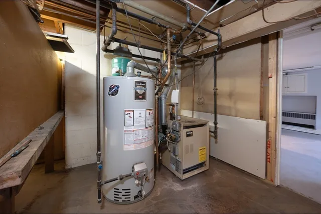 a utility room with cabinets