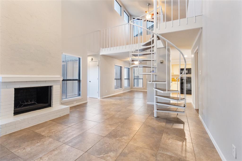 9611 Baseline Drive Dallas, TX 75243 - Photo 16 of 21 a view of entryway and hall with a living room