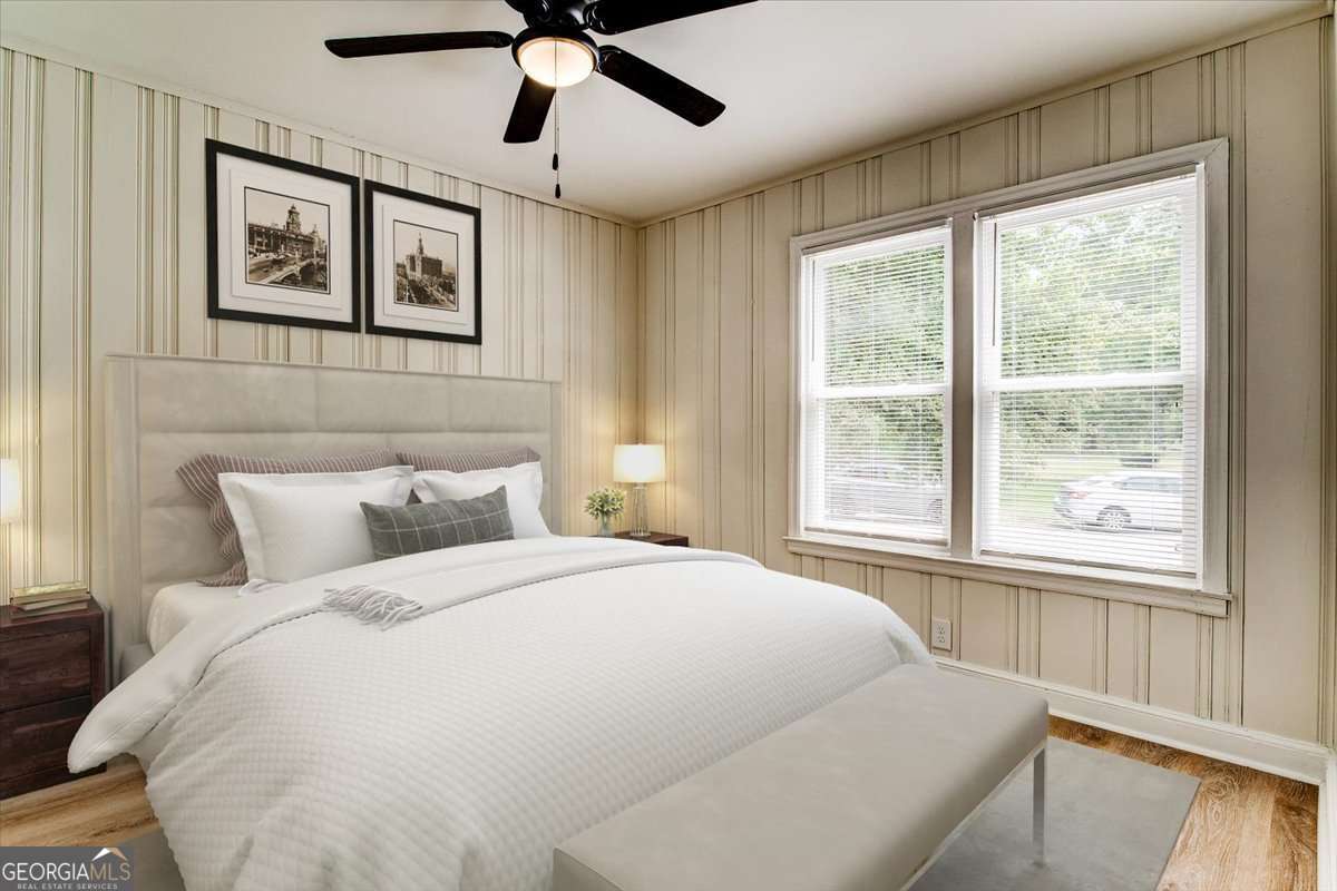 210 Bryan Street McDonough, GA 30253 - Photo 11 of 24 a large white bed in a bedroom next to a window