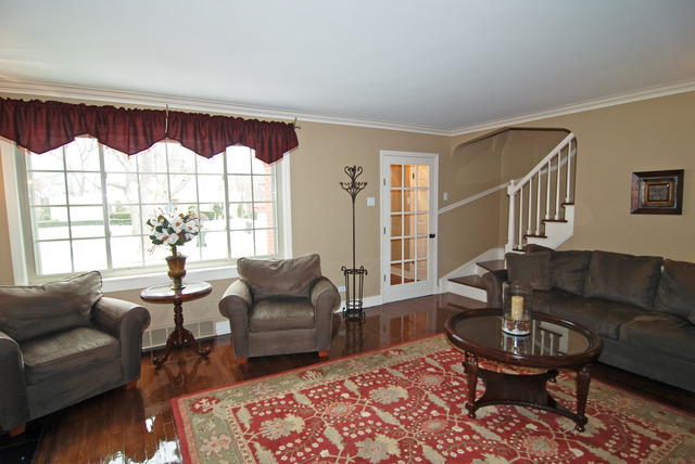 534 Byrd Road Riverside, IL 60546 - Photo 2 of 23 a living room with furniture a rug and a window
