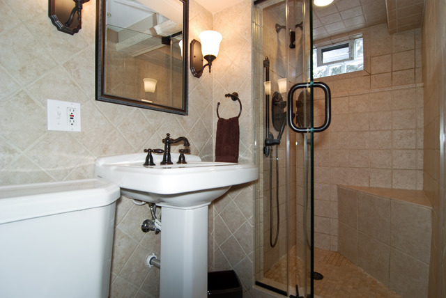534 Byrd Road Riverside, IL 60546 - Photo 11 of 23 a bathroom with a sink a mirror a toilet and shower