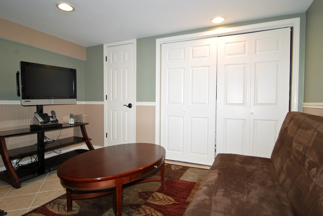 534 Byrd Road Riverside, IL 60546 - Photo 12 of 23 a living room with furniture and a flat screen tv