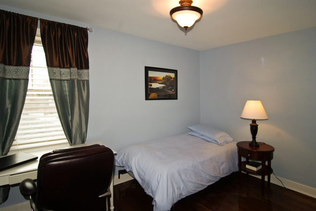 534 Byrd Road Riverside, IL 60546 - Photo 10 of 23 a bedroom with a bed and a window