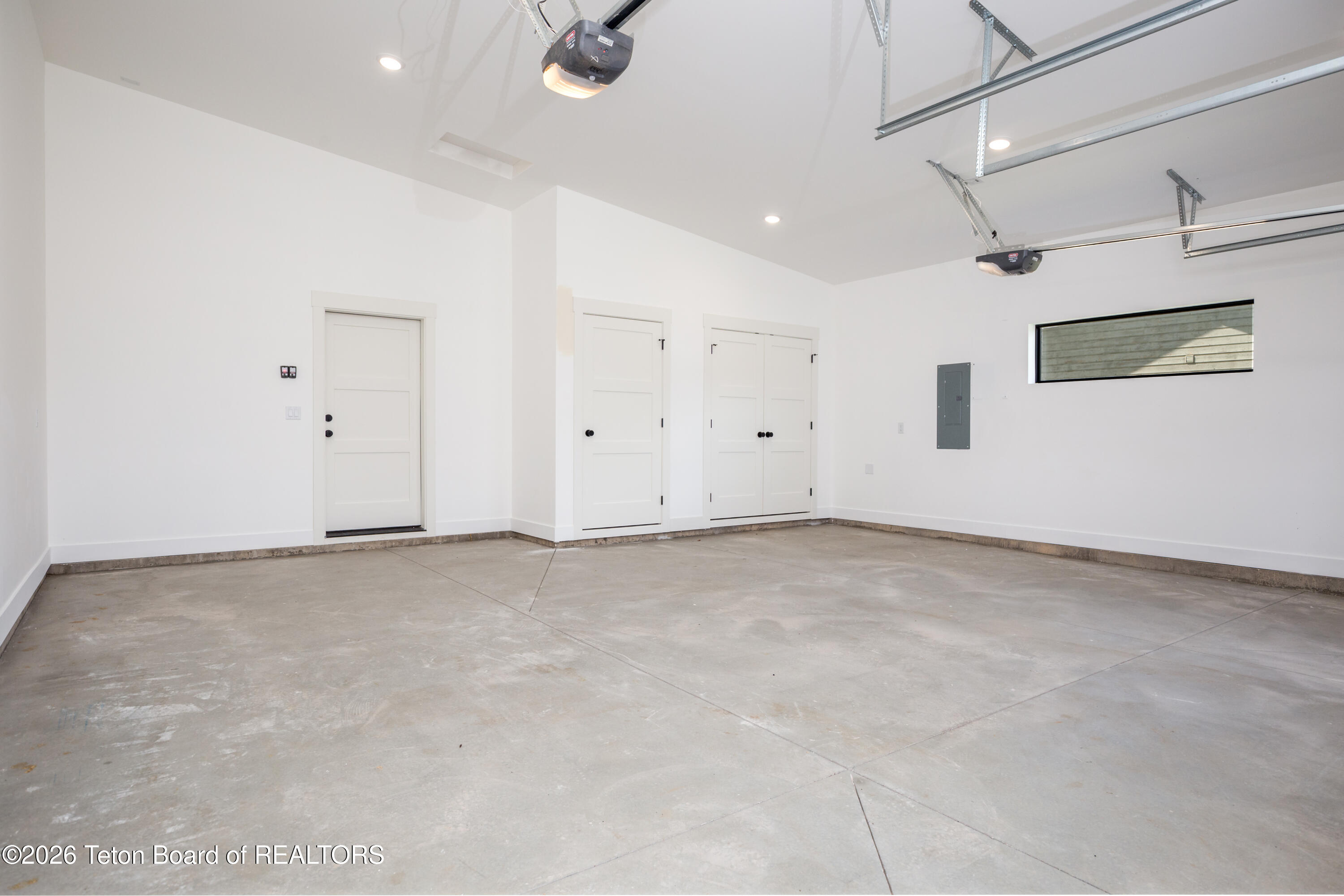 171 Alpine Trail Victor, ID 83455 - Photo 23 of 31 Garage with closet and mechanical room