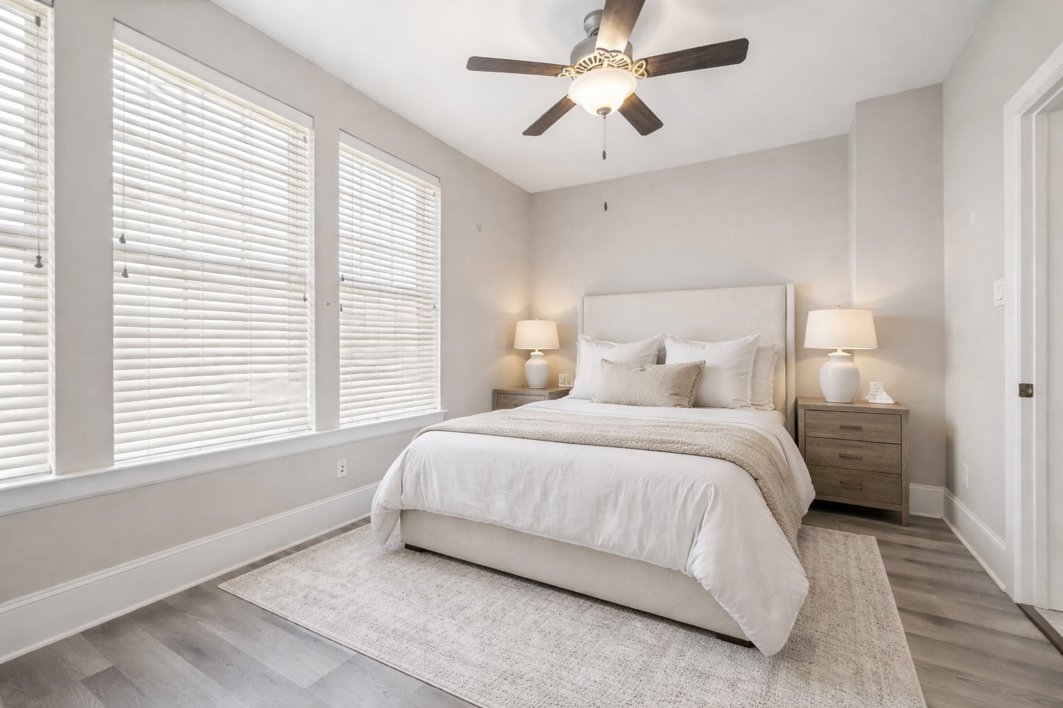 8318 Ginger Oak Street Houston, TX 77055 - Photo 12 of 20 a bedroom with a large bed and a window