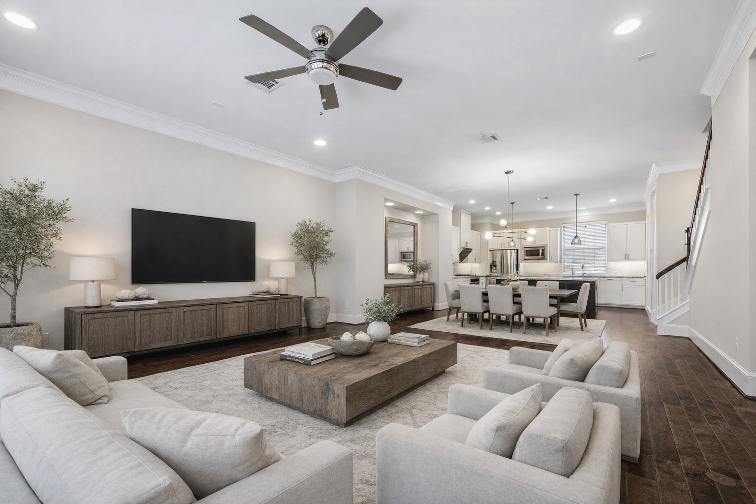 8318 Ginger Oak Street Houston, TX 77055 - Photo 2 of 20 a living room with furniture and a flat screen tv