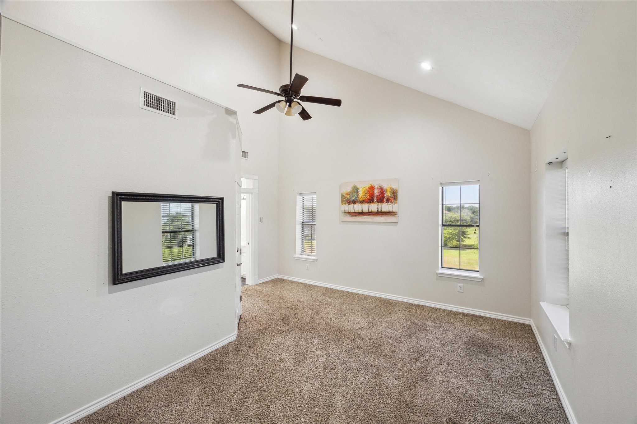 216 Rue Orleans Street Baytown, TX 77520 - Photo 18 of 43 a view of an empty room with a window