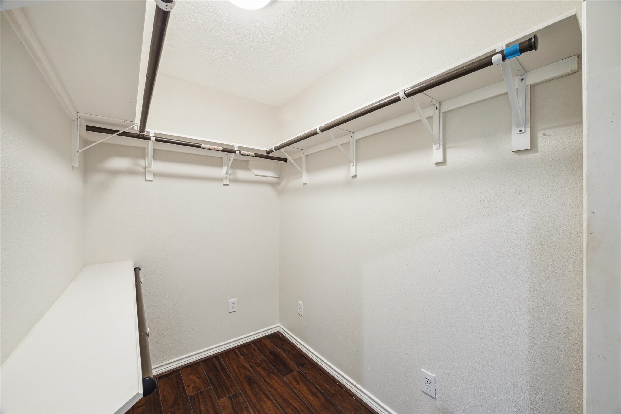216 Rue Orleans Street Baytown, TX 77520 - Photo 21 of 43 a view of a room with racks on the wall