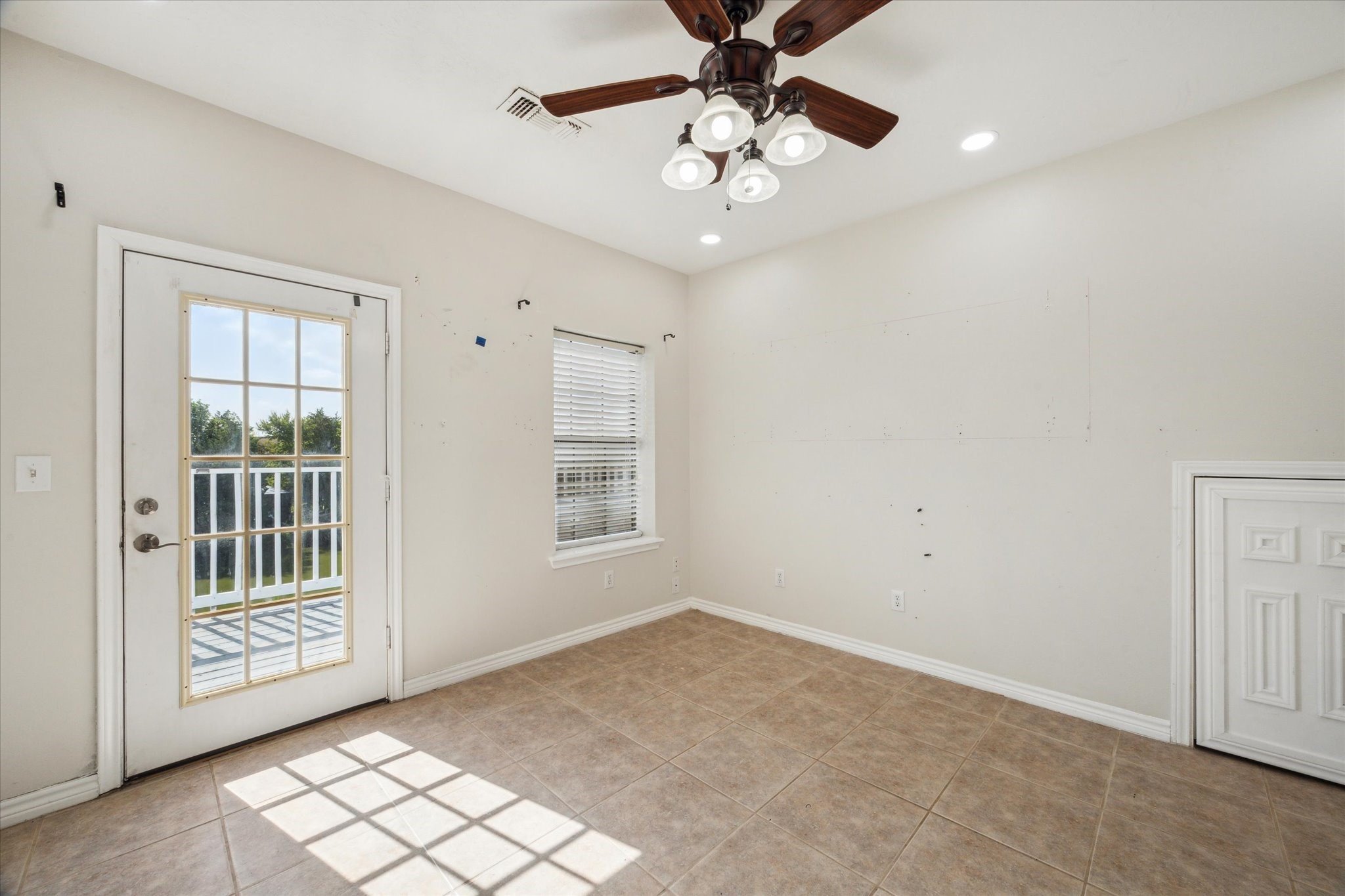 216 Rue Orleans Street Baytown, TX 77520 - Photo 27 of 43 a view of an empty room with a window