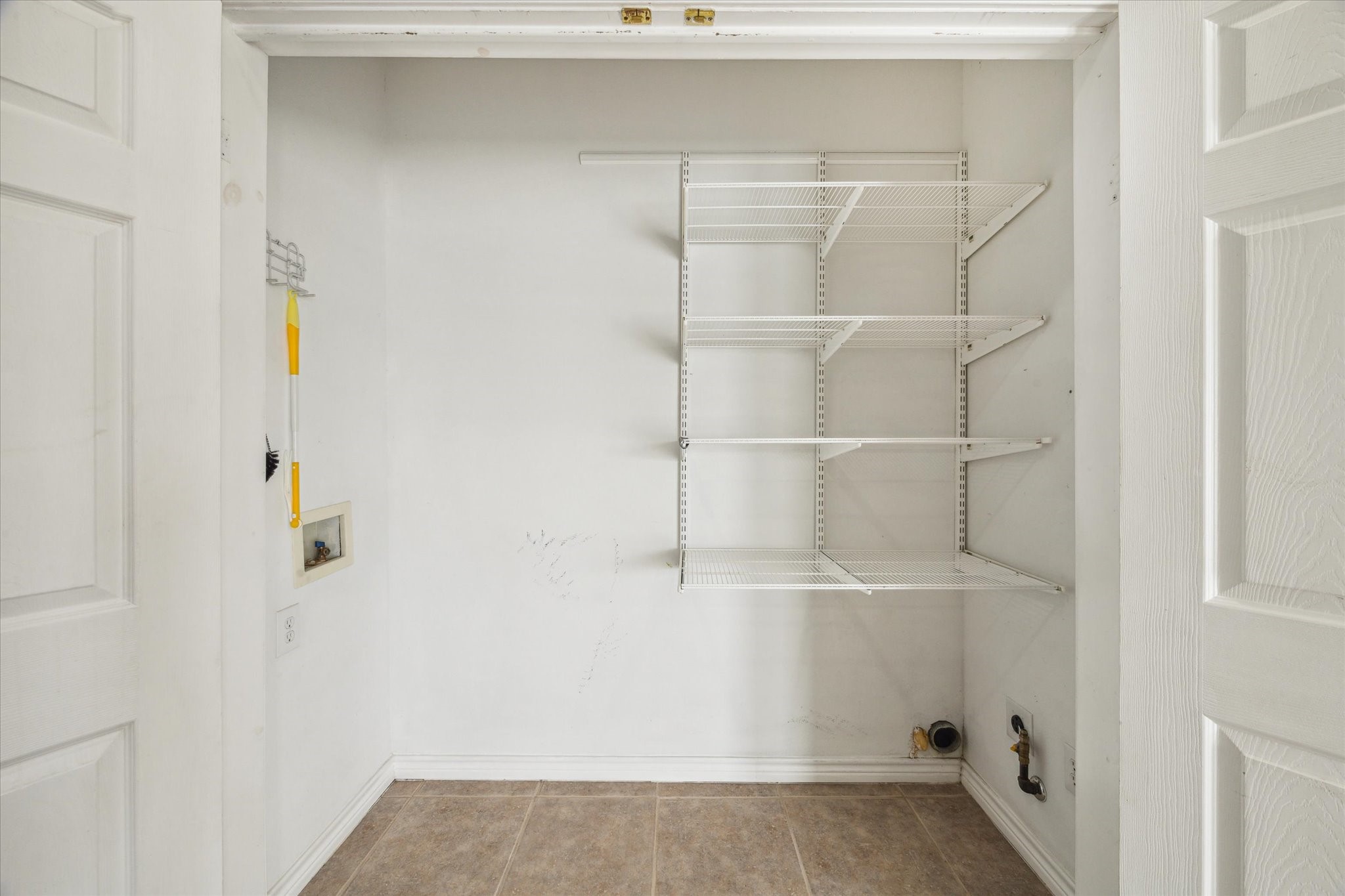 216 Rue Orleans Street Baytown, TX 77520 - Photo 29 of 43 a view of a walk in closet