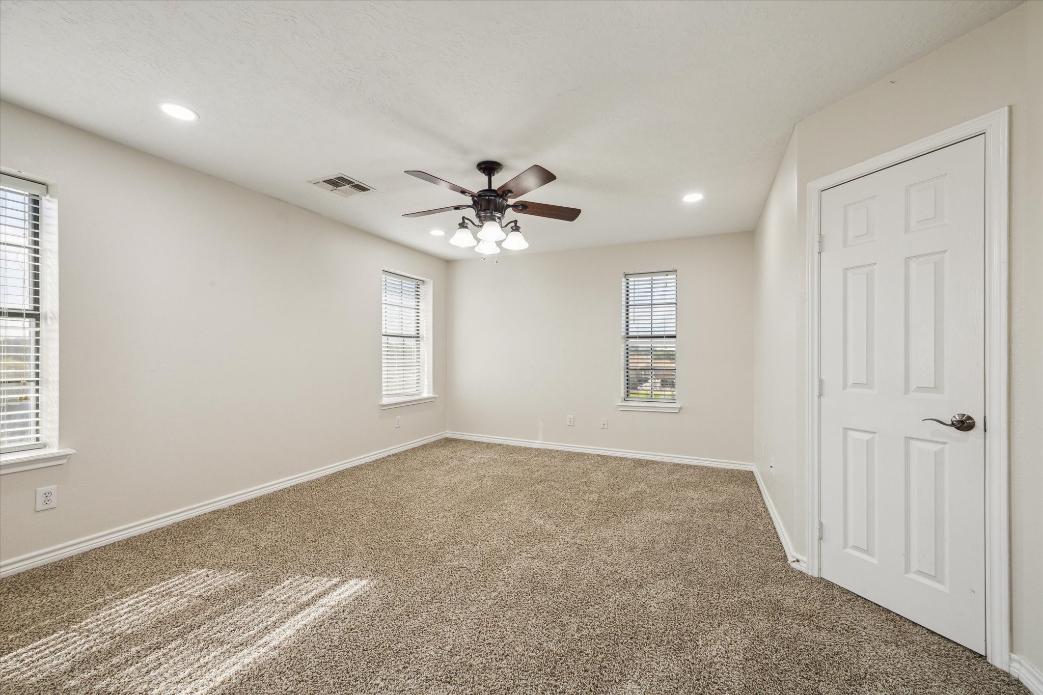 216 Rue Orleans Street Baytown, TX 77520 - Photo 32 of 43 a view of an empty room with a window