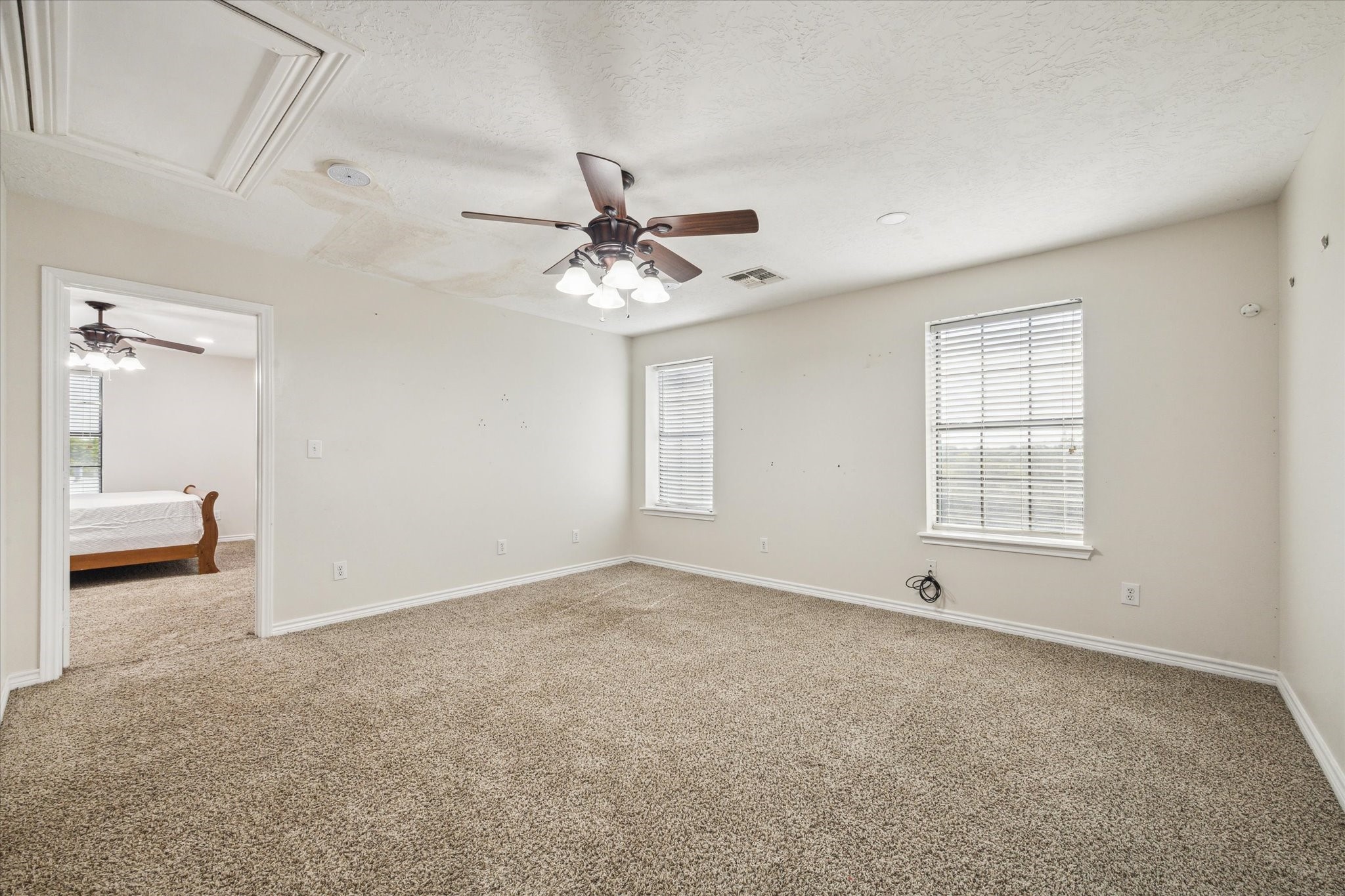 216 Rue Orleans Street Baytown, TX 77520 - Photo 34 of 43 a view of an empty room with a window