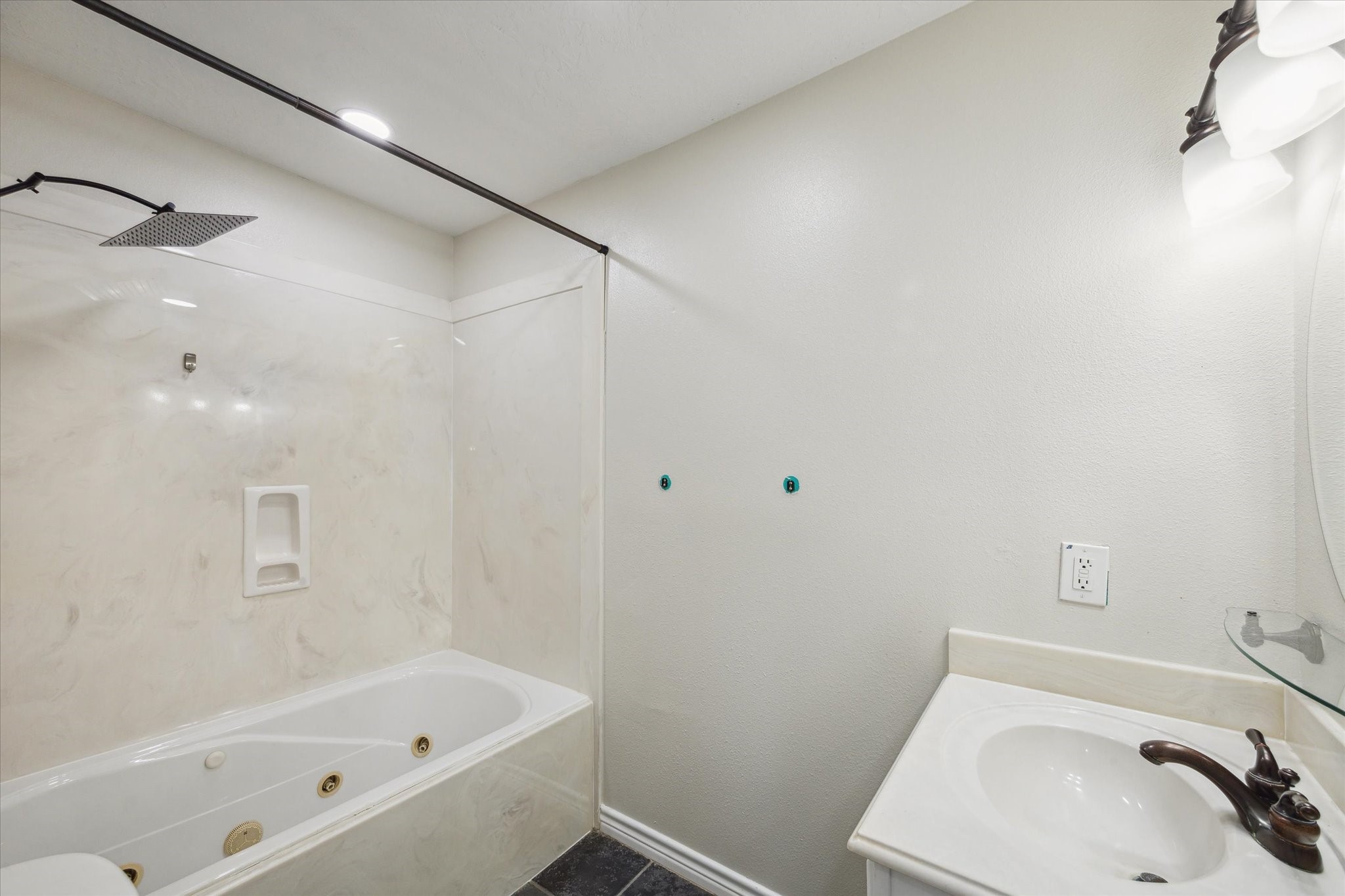 216 Rue Orleans Street Baytown, TX 77520 - Photo 38 of 43 a bathroom with a sink and bathtub