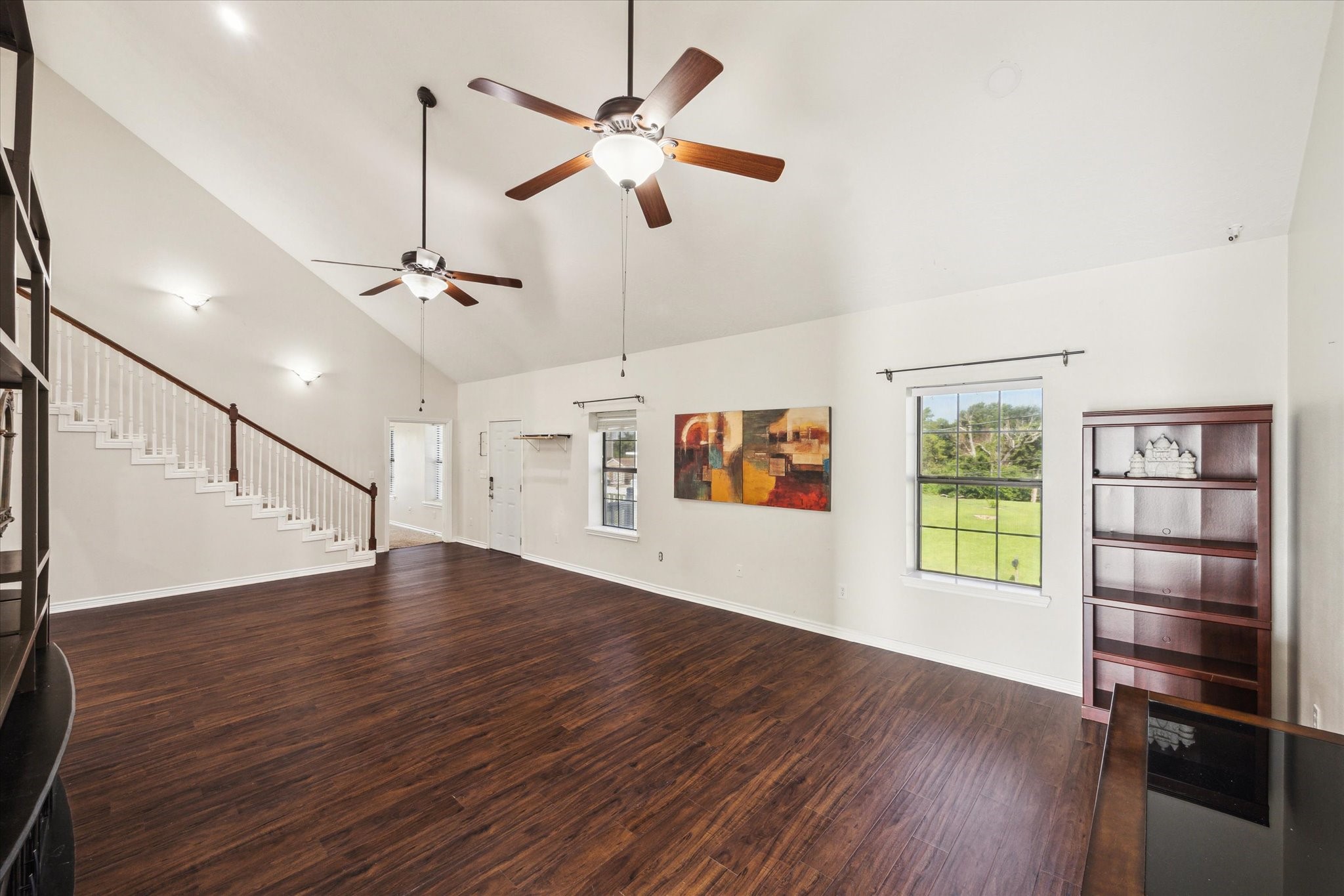 216 Rue Orleans Street Baytown, TX 77520 - Photo 10 of 43 wooden floor in an empty room with a window