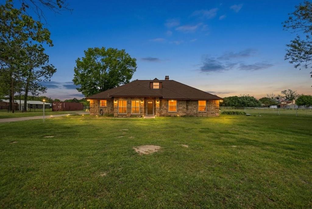 130 Beasley Road Combine, TX 75159 - Photo 2 of 19 a front view of a house with a yard