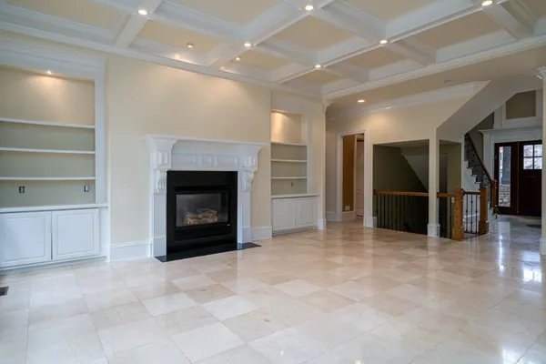 a kitchen with a sink counter top space and stainless steel appliances