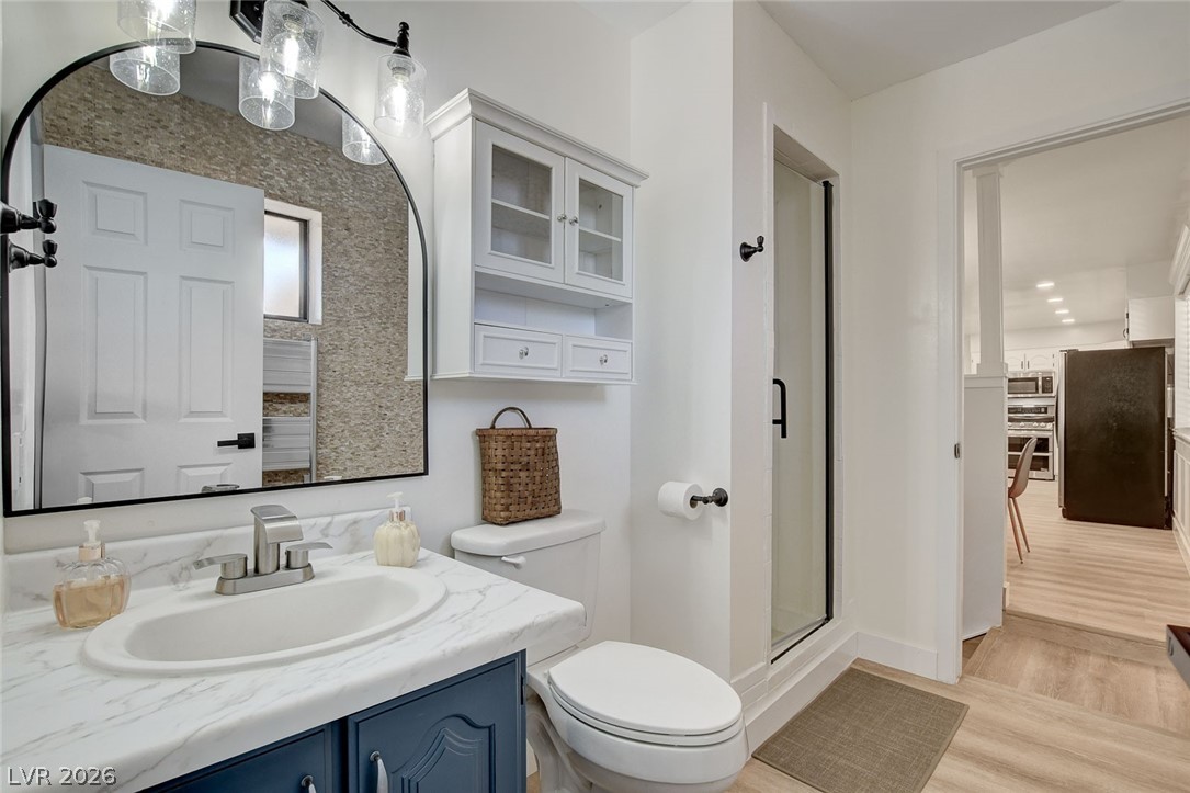 3765 Berkeley Street Logandale, NV 89021 - Photo 43 of 87 This functional bathroom features a modern vanity and convenient shower access.