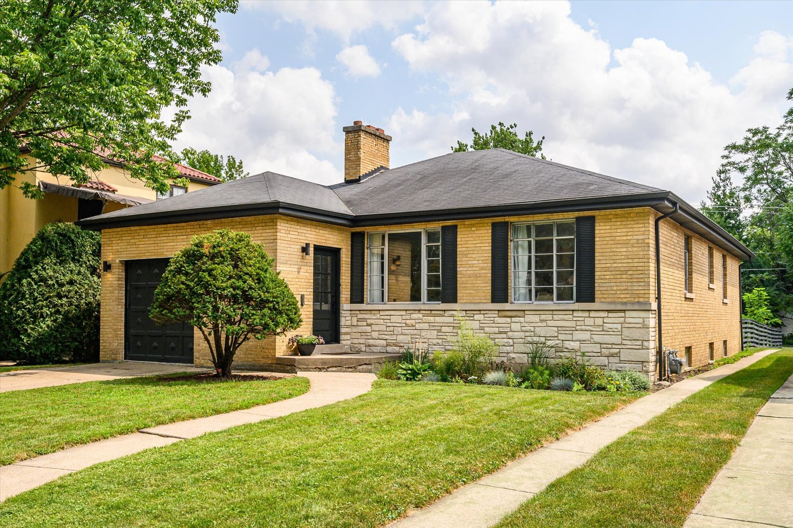 277 Olmsted Road Riverside, IL 60546 - Photo 1 of 34 a view of a house with a yard