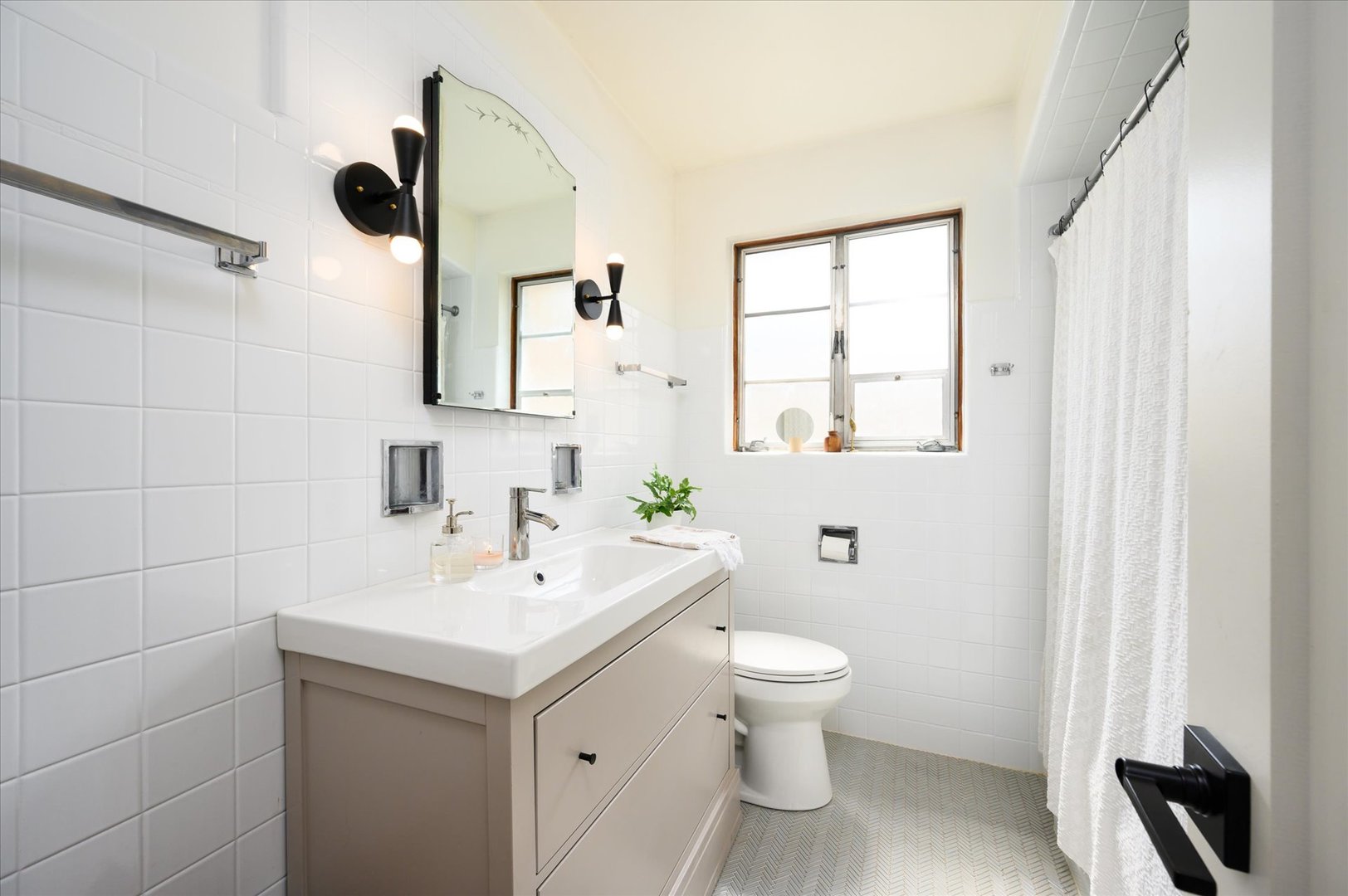 277 Olmsted Road Riverside, IL 60546 - Photo 16 of 34 a bathroom with a toilet sink and mirror