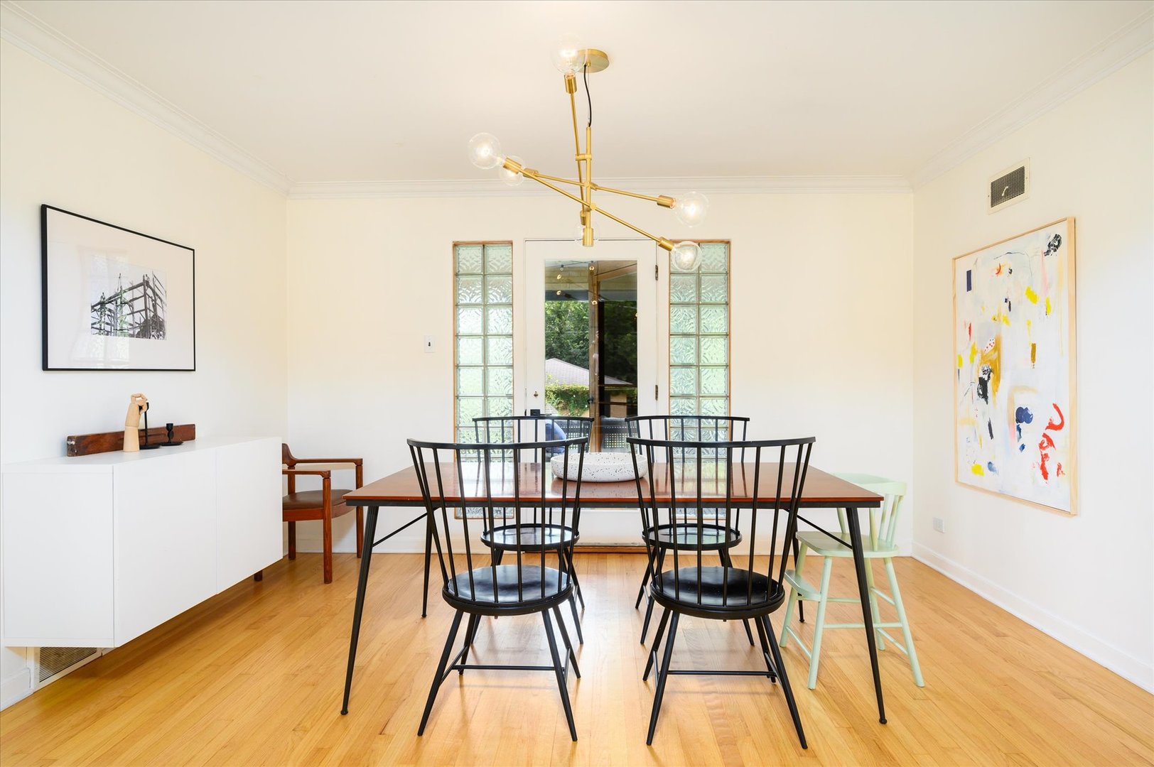 277 Olmsted Road Riverside, IL 60546 - Photo 7 of 34 a view of a dining room with furniture window and wooden floor