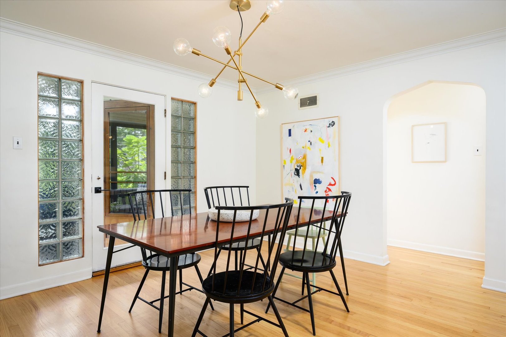 277 Olmsted Road Riverside, IL 60546 - Photo 8 of 34 a view of a dining room with furniture window and wooden floor