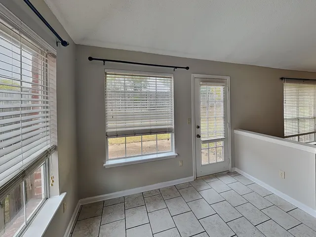 a view of an empty room with window