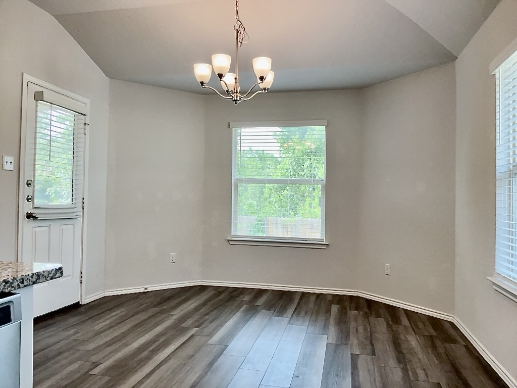 124 Marcel Court Taylor, TX 76574 - Photo 6 of 17 Dining area with view to backyard open to kitchen and living areas